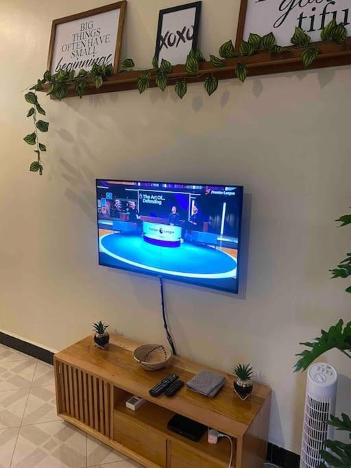 Town Retreat Moshi Apartment Bagian luar foto